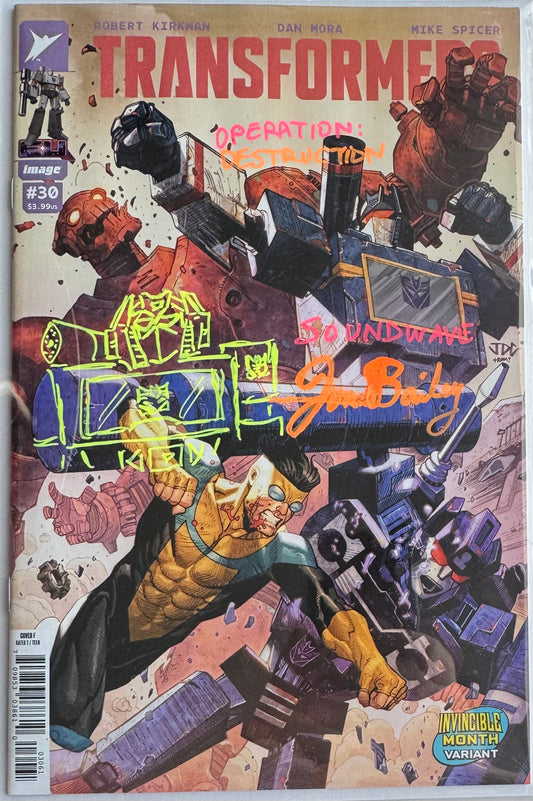 TRANSFORMERS #30 CVR F JOSH CASSARA INVINCIBLE TEAM UP VAR (1st Print) [SIGNED BY JON BAILEY, VOICE OF OPTIMUS PRIME & SOUNDWAVE] OPERATION DESTRUCTION REMARK