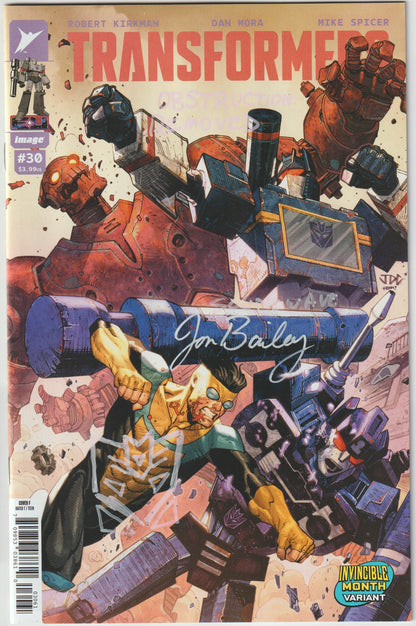 TRANSFORMERS #30 CVR F JOSH CASSARA INVINCIBLE TEAM UP VAR (1st Print) [SIGNED BY JON BAILEY, VOICE OF OPTIMUS PRIME & SOUNDWAVE] OBSTRUCTION REMOVED REMARK